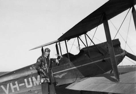 Squadron Leader Alex Kynoch with his Tiger Moth