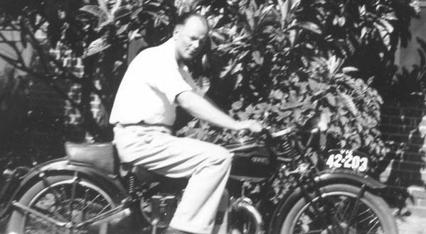 Alex & his Douglas motorcycle in the backyard